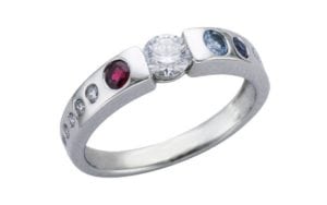 Bejewelled diamond and gemstone birthday ring