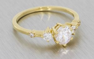 A Delicate Three Stone Engagement Ring Set Diamonds