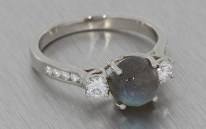 Labaradite and diamond three stone ring
