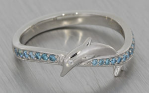 Platinum and blue diamond engagement ring