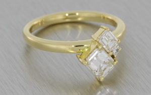 Contemporary three stone diamond ring