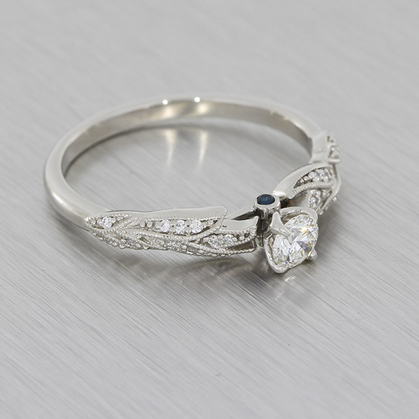 Vintage & nature inspired halo engagement ring