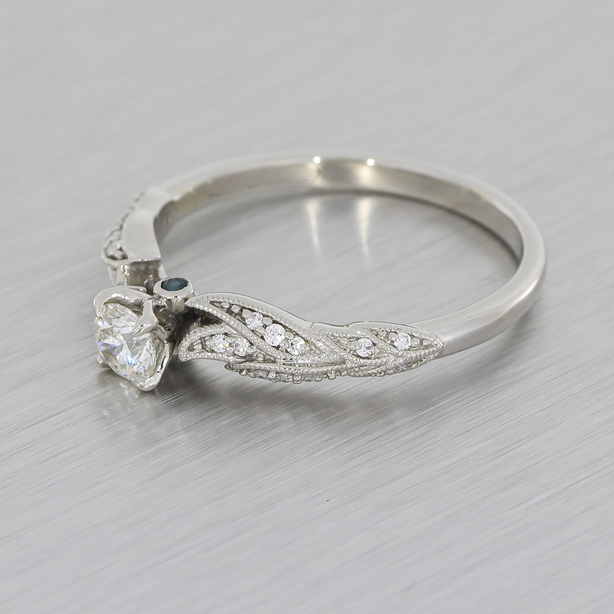 Vintage & nature inspired halo engagement ring